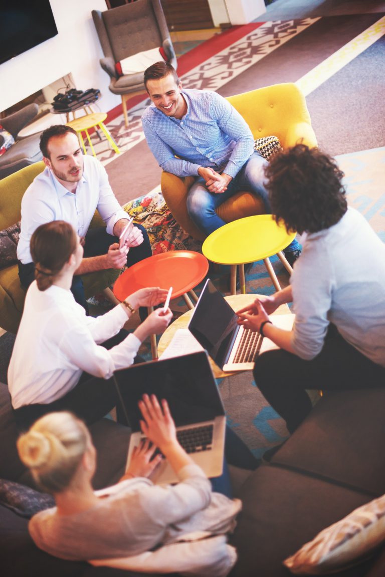 startup-business-team-at-a-meeting-at-modern-office-building.jpg